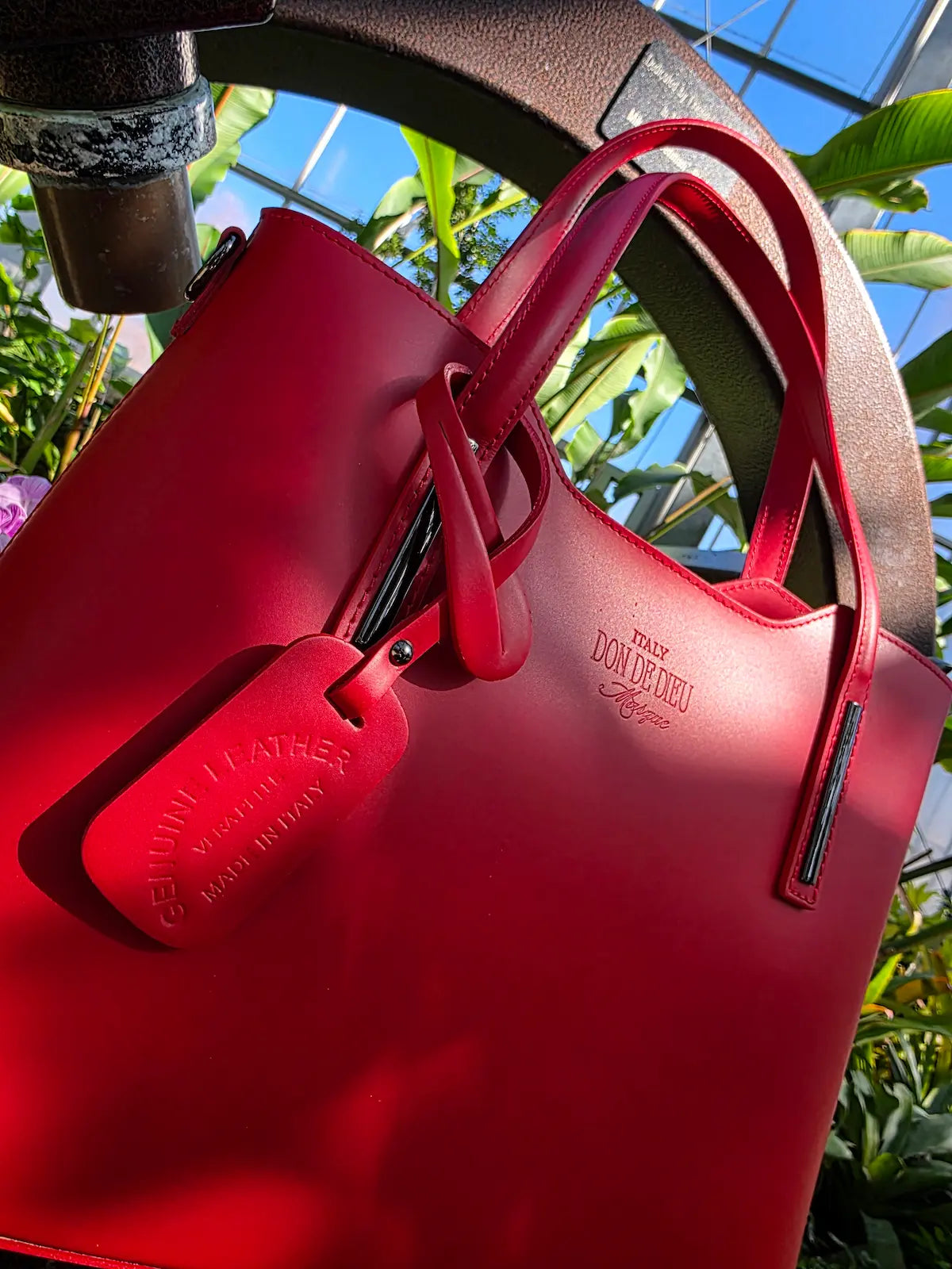 Italian leather handbag in natural setting — Don de Dieu Marque