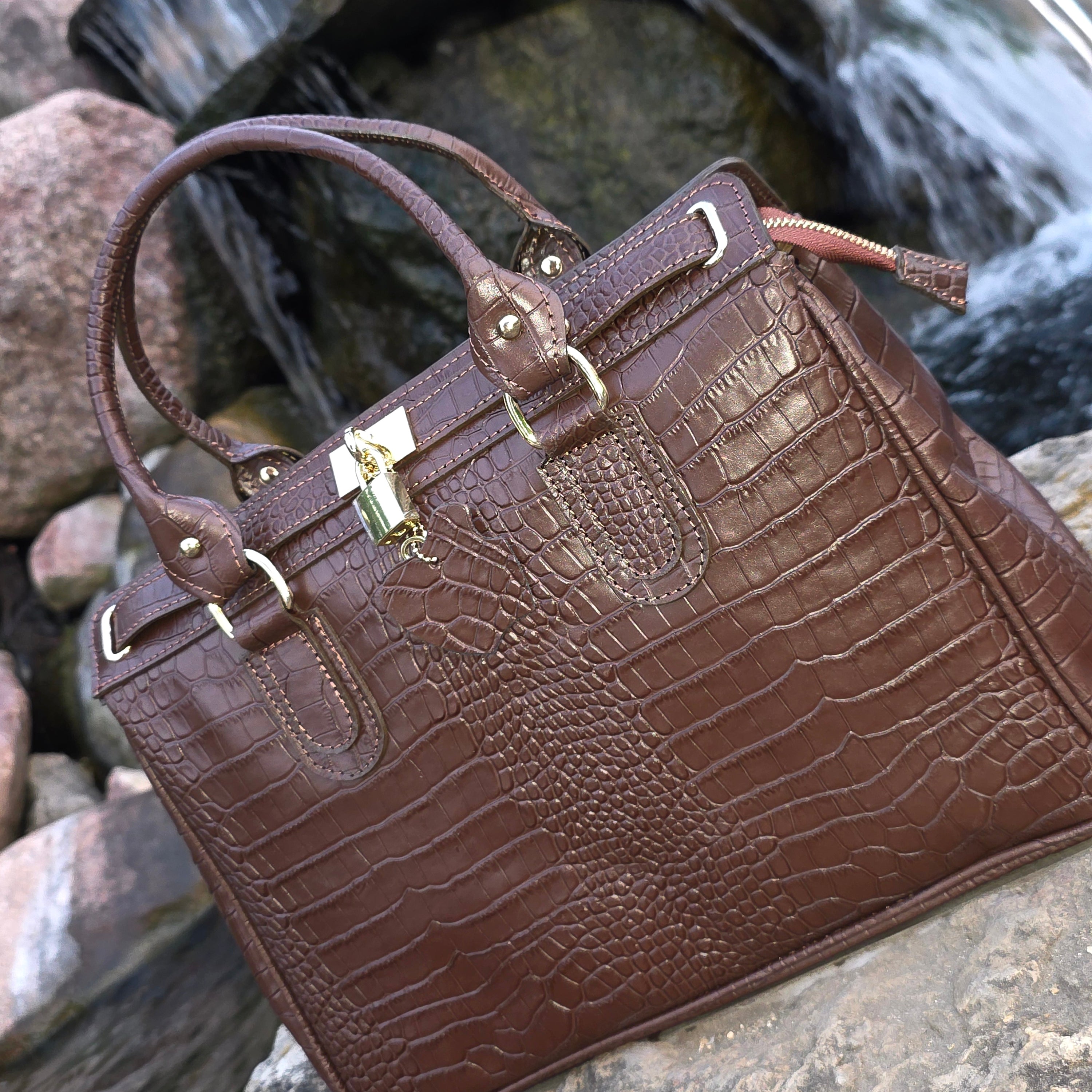 Brown Italian Leather Top Handle waterfall background — Don de Dieu Marque